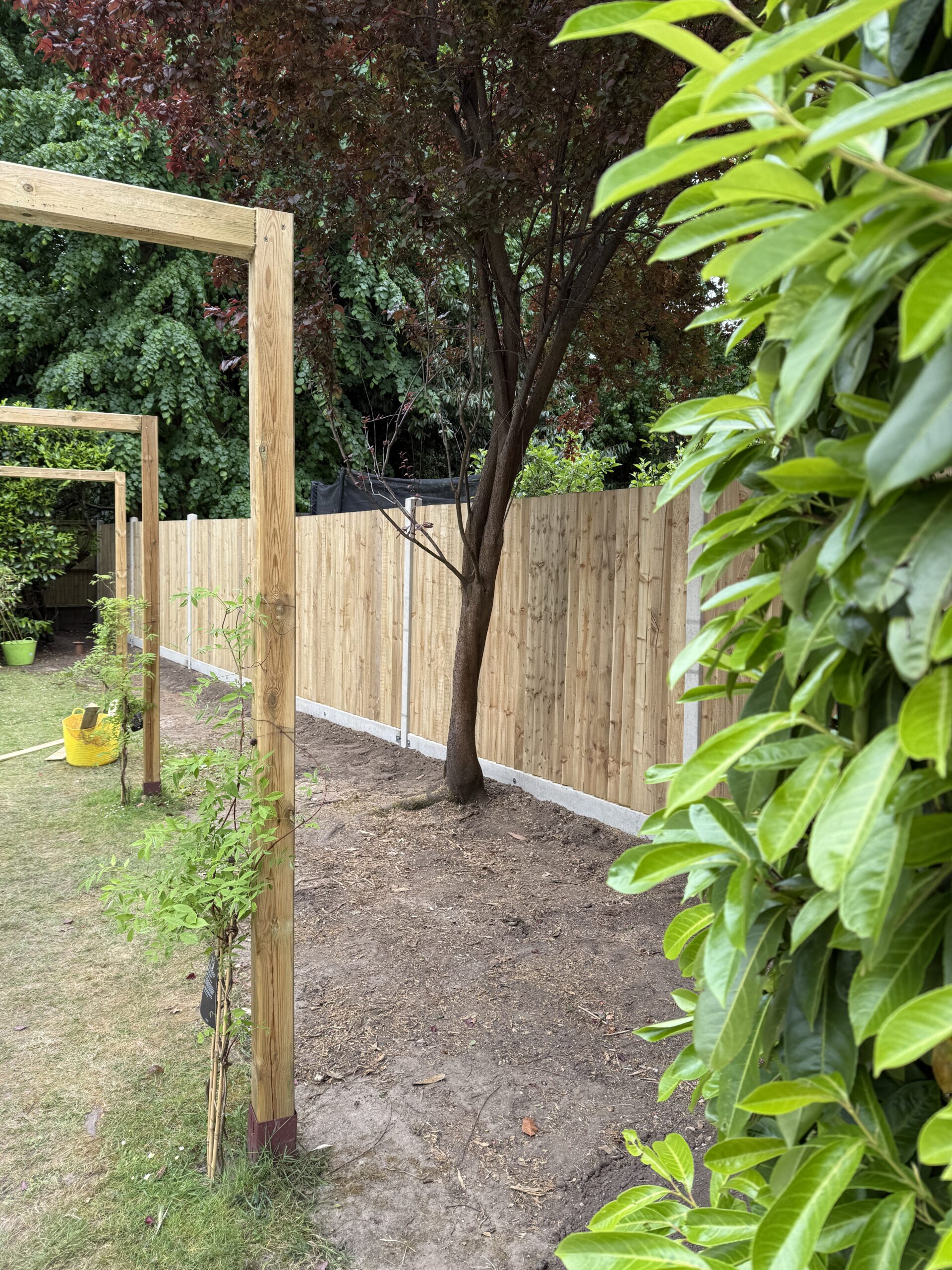 closeboard fencing with concrete gravelboards and posts