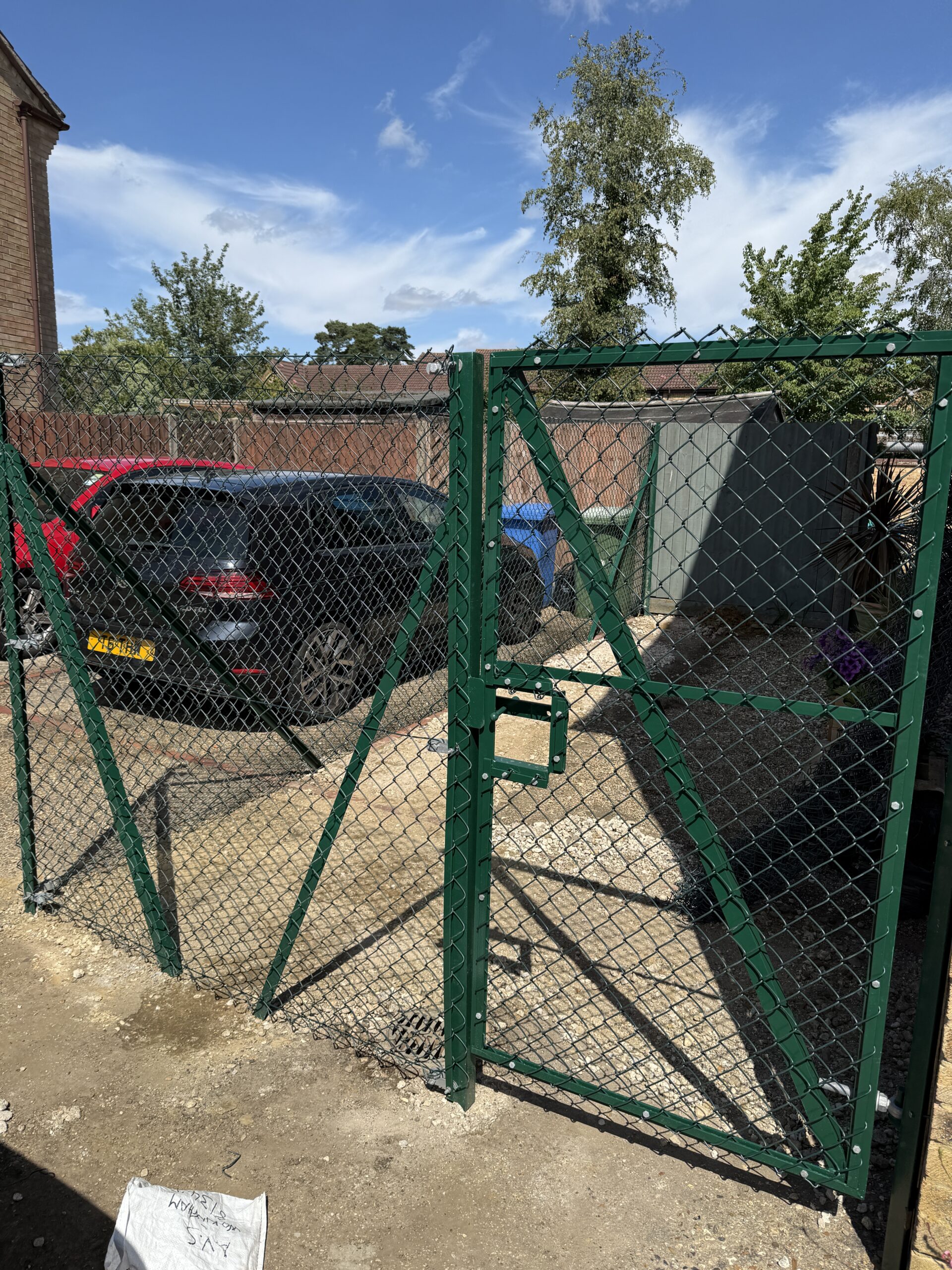 green chainlink fencing with gate in Wokingham
